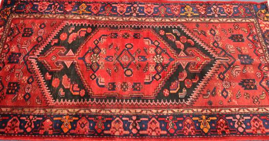 A Hamadan rug, 205cm x 107cm